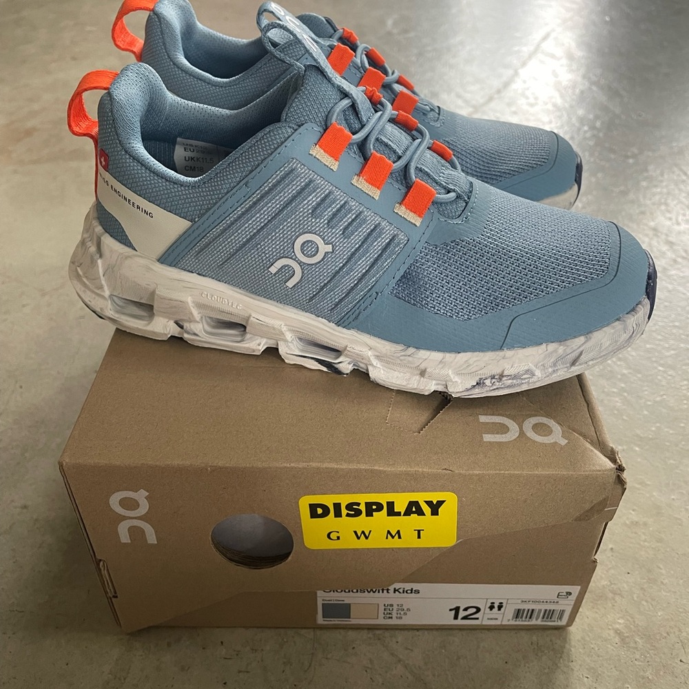 On Running Kids Sneakers in Blue and White with Orange Accents